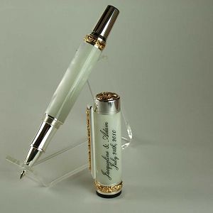 Wedding pen made for some friends. Sterling silver & gold titanium with a white pearl body. Looks awesome in person.
