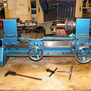 1979 Heathway 11/4" bore. 8" swing glass blowing lathe. 17" between spindles. Right hand spindle travels left and right as well as the "fire carriage"