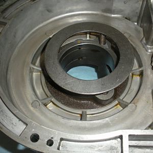 Place the washer over the springs like shown.