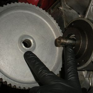Install the timing gear pulley on to the pinion gear shaft.