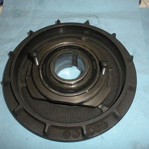 Brake bearing cap. This is just to show those two screws that hold the brake bearing cap to the lower belt housing.