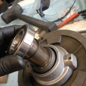 A new bearing (6007 double sealed) should be installed on top of the spindle pulley hub.
