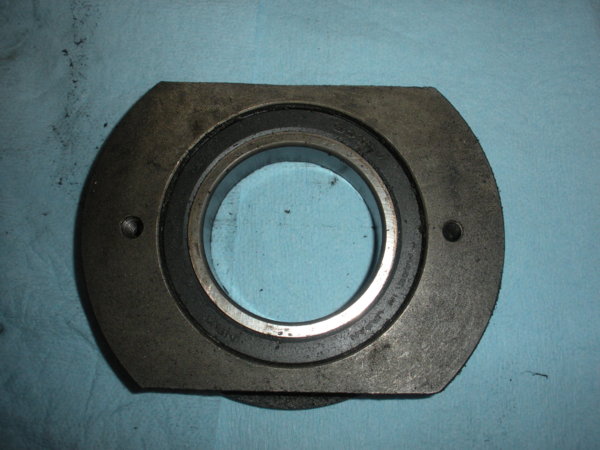 Brake bearing cap after removal. Old bearing still in place. Top view.