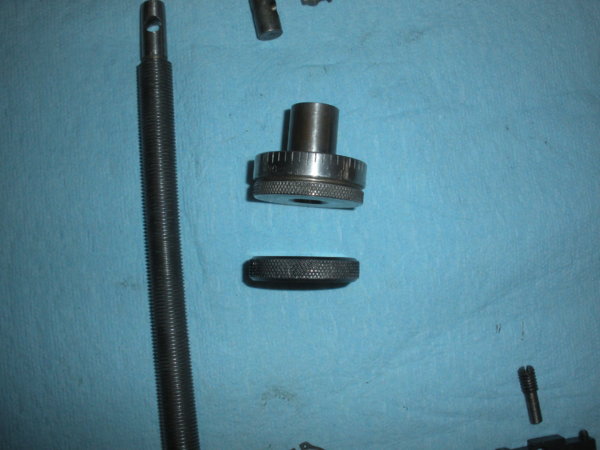 Micrometer nut with locking nut.