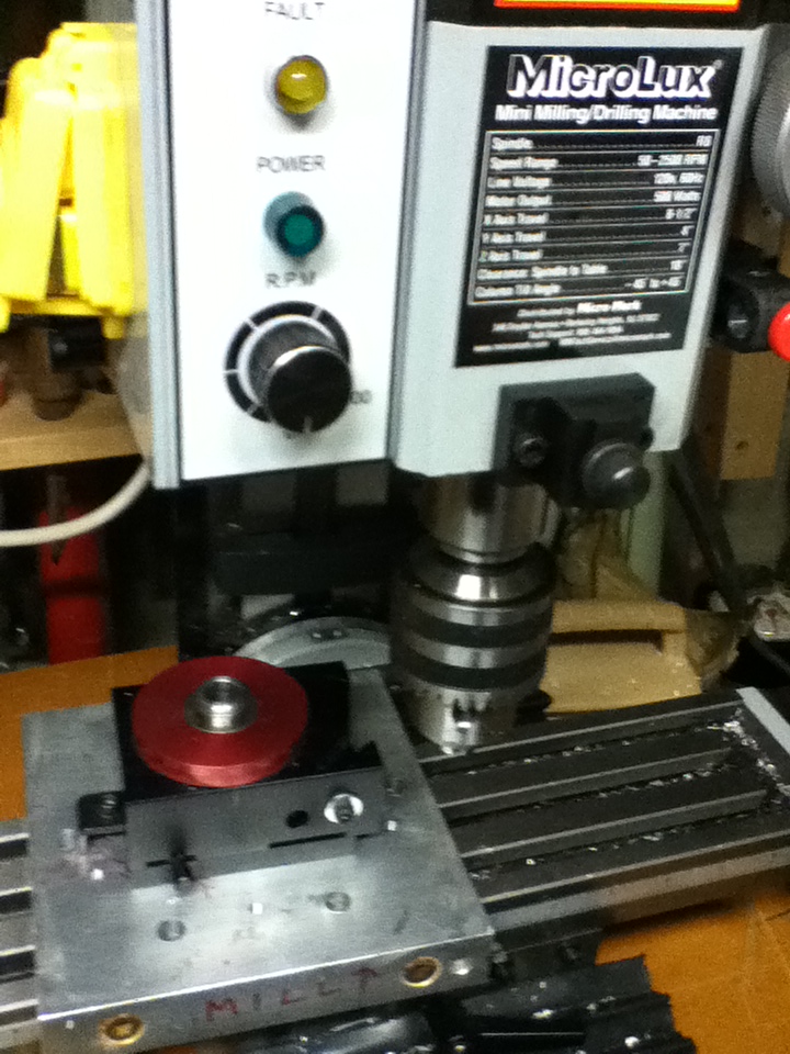 new r8 mill and scrap plate i will be using to protect table and add some sherline stuff i have