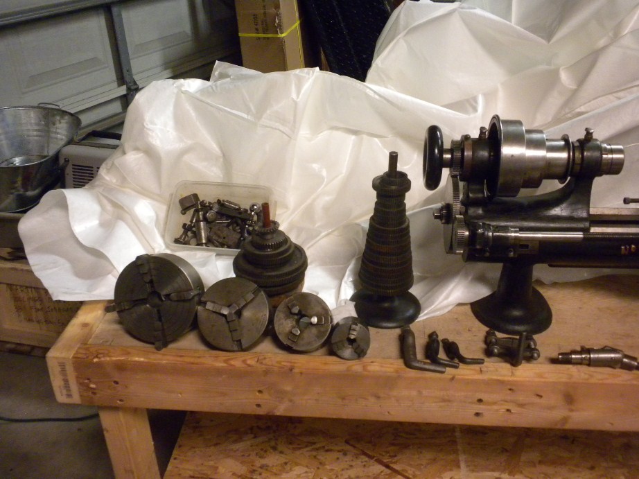 Restored Screw cutting Sloan & Chace 5-1/2 lathe with attachments.
Head stock, gears,chucks, dogs etc.