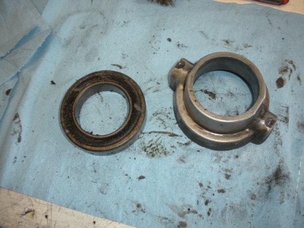The old bearing after being pressed out of the "bearing sliding housing".  Not much to this assembly.