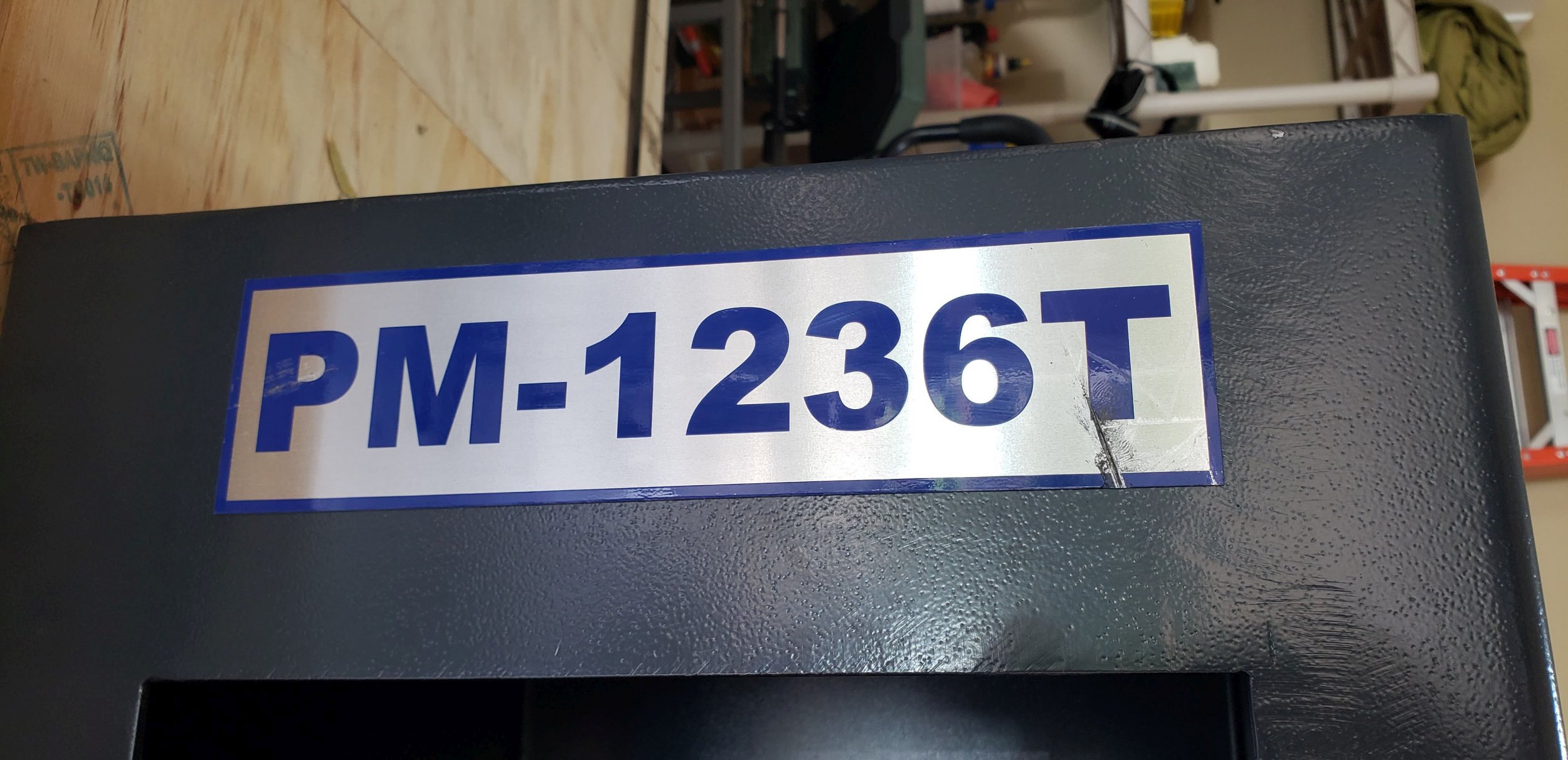 PM1236T Nameplate gouge.jpg