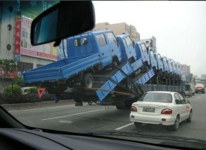 A-Truck-Overloaded-With-Other-Trucks.jpg
