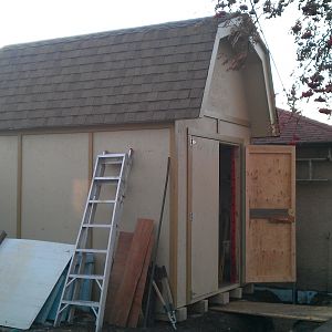 Two story 8x12hed. open loft in top with 44" headroom.I  used a "Gorrilla" garage lift platform for the elevator.