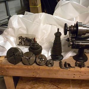 Restored Screw cutting Sloan & Chace 5-1/2 lathe with attachments.
Head stock, gears,chucks, dogs etc.