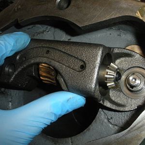 Install the cluster gear cradle over the top of the cluster gear input shaft.