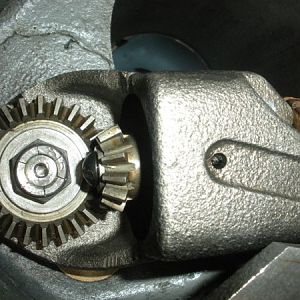 Top of cluster gear input shaft with bevel gear and nut installed.