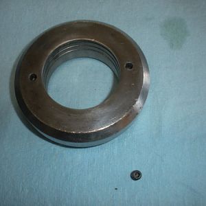 Spindle nose piece assembly with set screw.