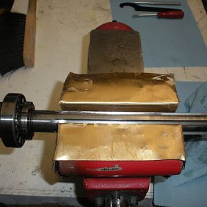 Mount the spindle in a vice...using brass/soft jaws. I have mine covered with brass sheets. Have the bearings on your left.