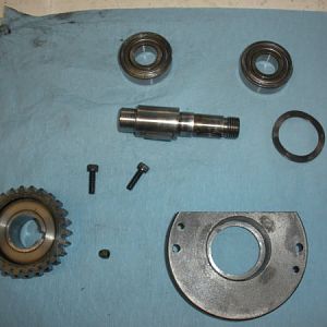 Pinion gear assembly with cover.