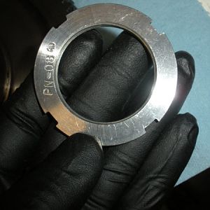 Lock nut top down view for holding the bull gear bearing sleeve in place.