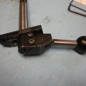 Attach the handle to the hi-low shift crank using the two socket head screws as shown.
