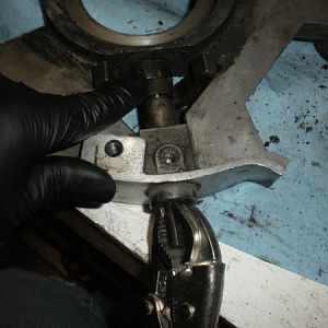Pull the brake shaft out with a pair of vise grips.