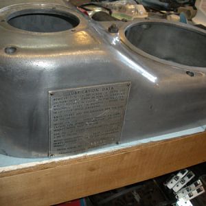 Cleaned upper belt housing showing right side with the lubrication plate.
