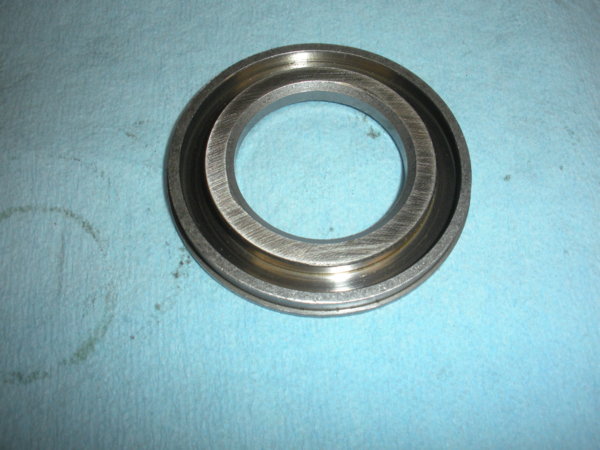 Bearing dirt shield top view. This side towards the bearing.