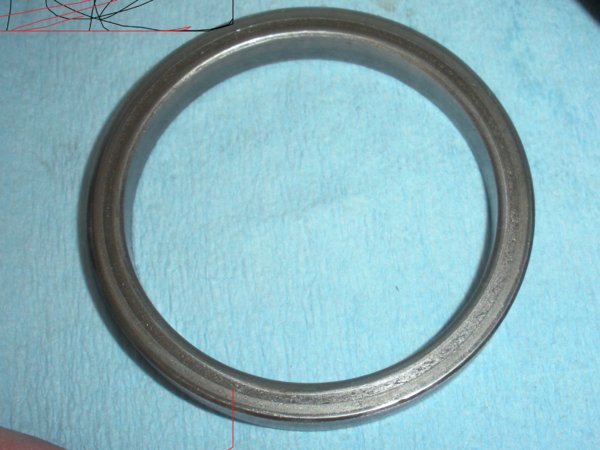 Bearing spacer ring that goes on the brake bearing cap after the cap has been installed.