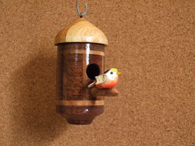 Birdhouse ornament. Walnut, Maple, and Cherry for the roof.