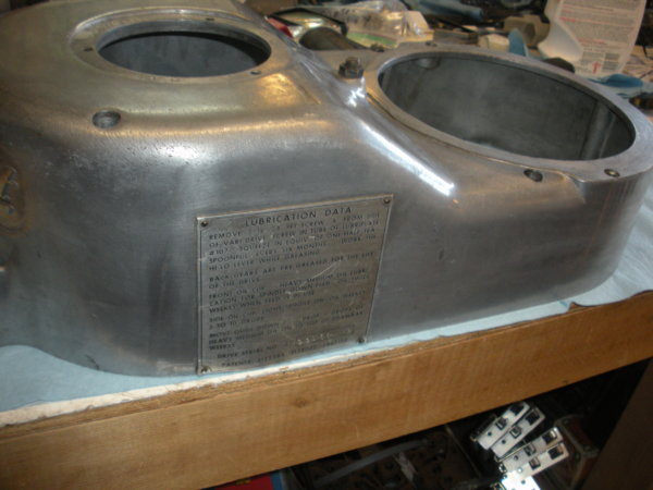 Cleaned upper belt housing showing right side with the lubrication plate.