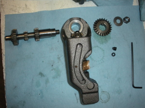 Cluster gear cradle assembly with cluster gear input shaft.