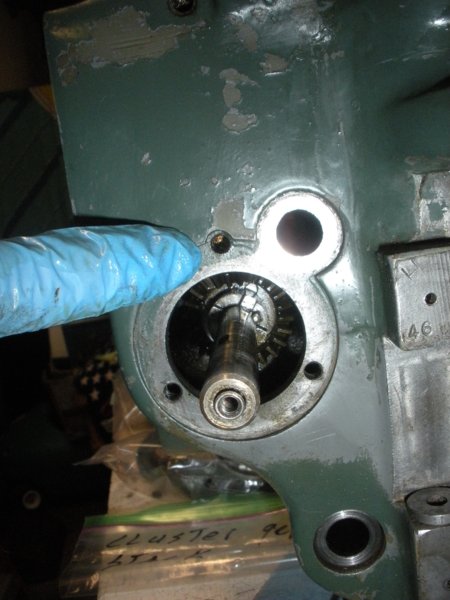 Cluster Gear set screw location. Front of head just above the feed reverse clutch worm shaft.