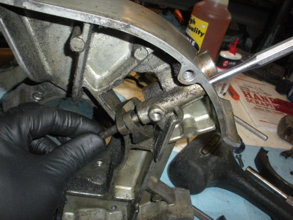 Drive the brake pivot stud through the housing and the brake fingers like this. You can leave the snap ring on the end.