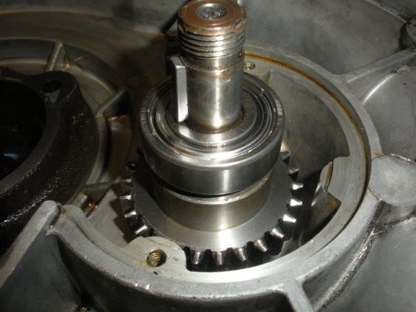 Install the complete pinion gear into the casing.