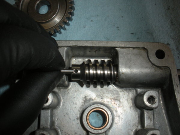 Install the roll pin to hold the gear on to the shaft.