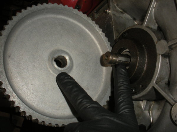 Install the timing gear pulley on to the pinion gear shaft.