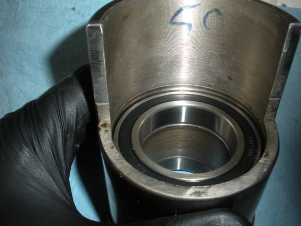 New 6908 bearing pressed into place on the top part of the bull gear bearing sleeve.