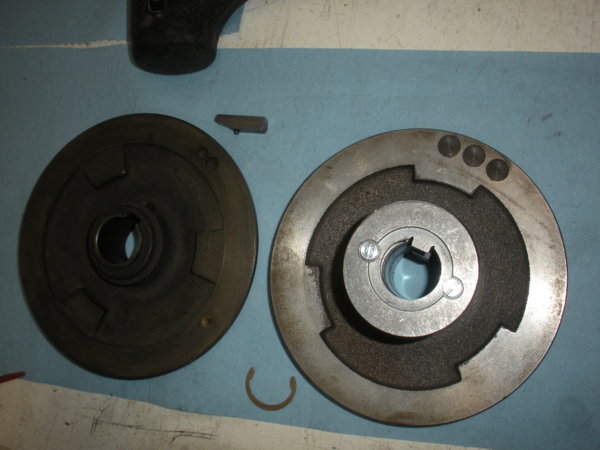 Next the motor fixed pulley and the variable pulley are to be installed. The variable disk on the right has been rebuilt/