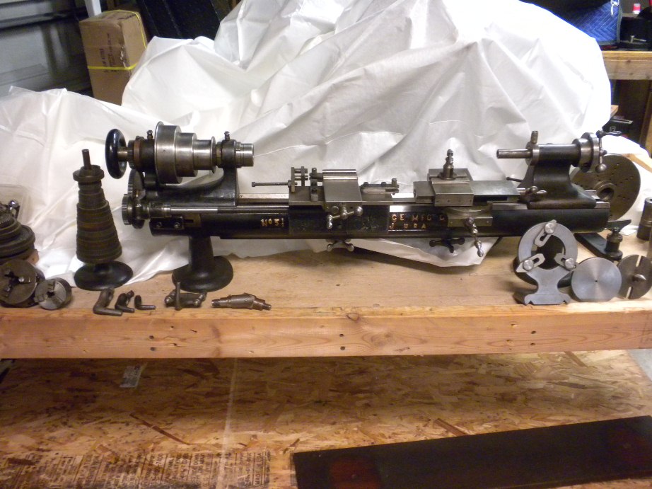 Restored Screw cutting Sloan & Chace 5-1/2 lathe with attachments.
Front view