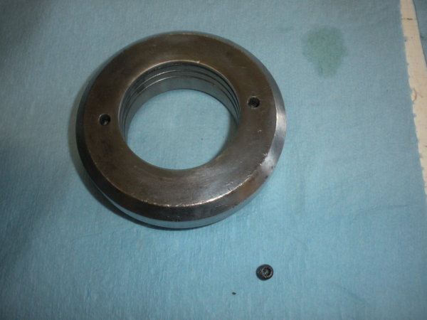 Spindle nose piece assembly with set screw.