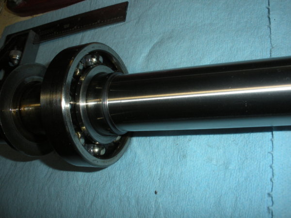 Spindle showing bottom bearing just before pressed off.