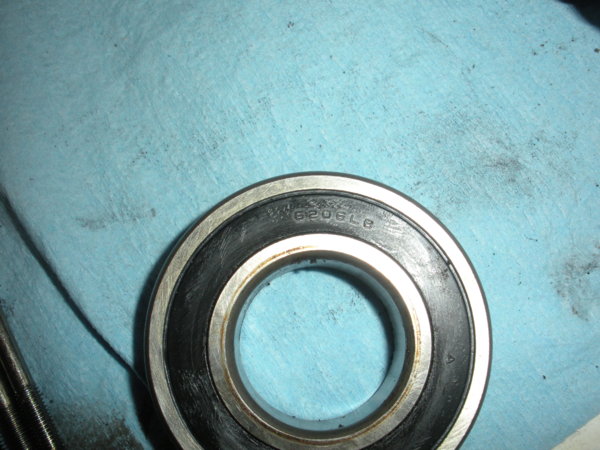The old bearing from the output end. Remember the smaller end is a 6203 and this is a 6206 double SEALED not shielded!