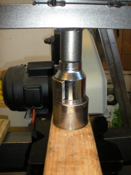 This is how I press my bearings into place. Using a large 3/4" drive socket.  Pressing only on the outer race.