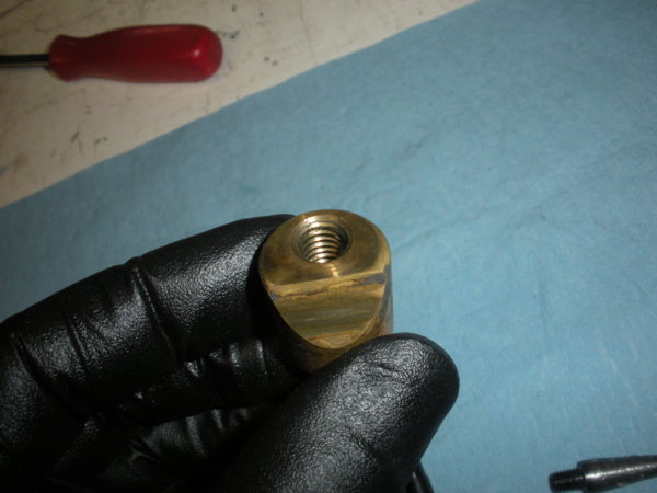 This is the threaded locking quill shoe. It goes on the side with the threads on the lock bolt.
