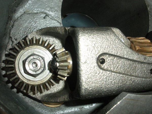 Top of cluster gear input shaft with bevel gear and nut installed.
