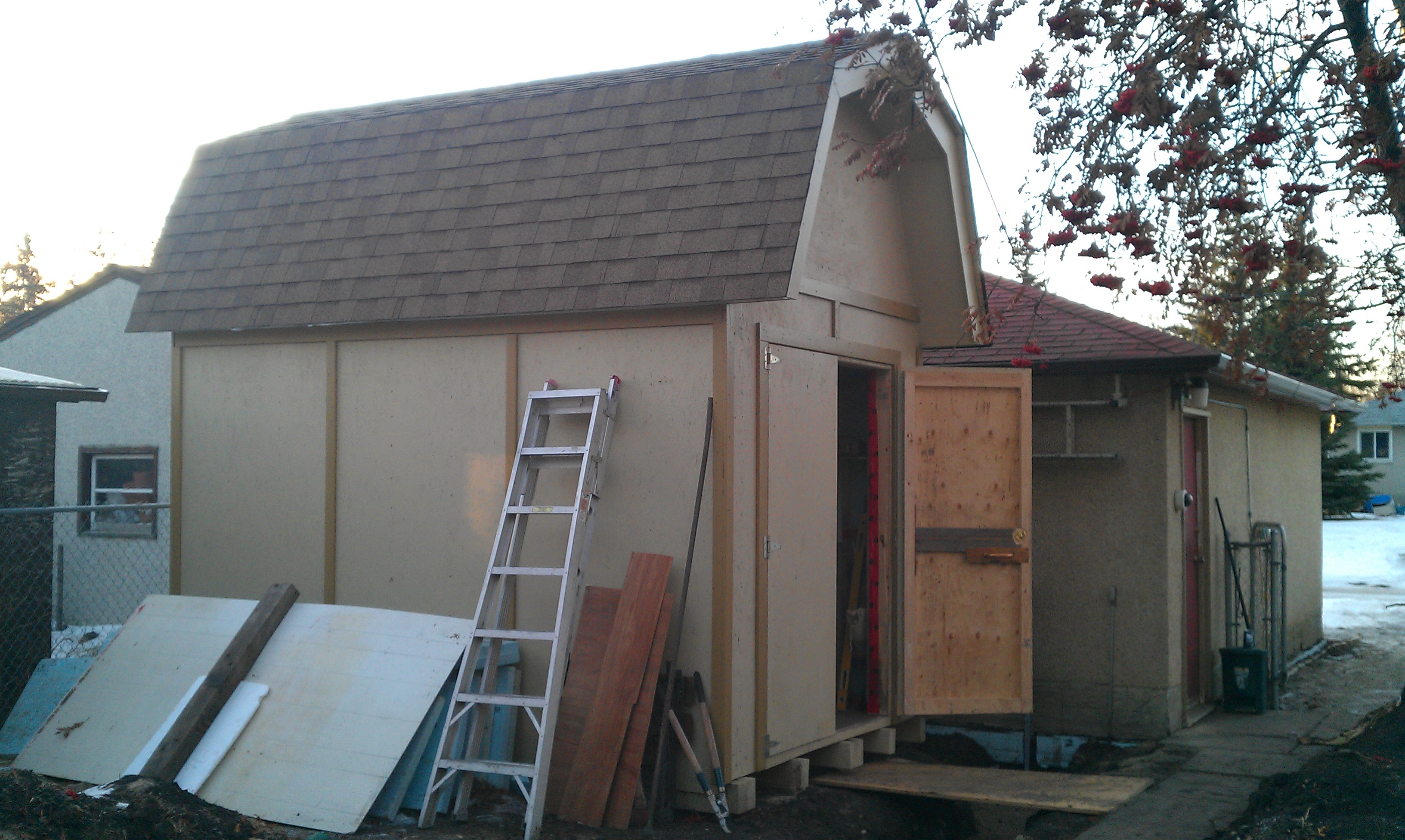 Two story 8x12hed. open loft in top with 44" headroom.I  used a "Gorrilla" garage lift platform for the elevator.