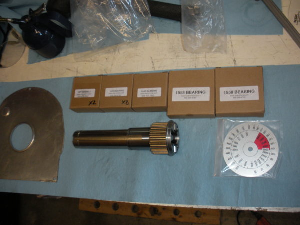 Various bearings going into the top end. New gear cover, new speed dial, New spindle gear hub.